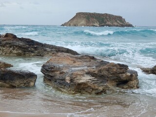 Rough tide under stormy sky.