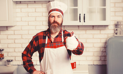Professional chef man showing sign for delicious.