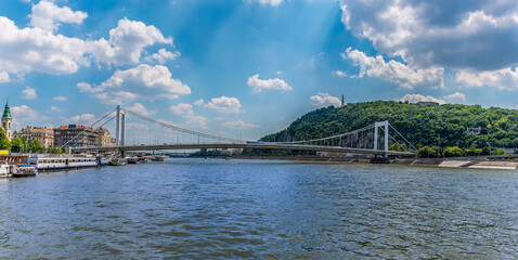 A view of the Elizabeth Bridge across the River Danube in Budapest and the Gellert Hill during summertime