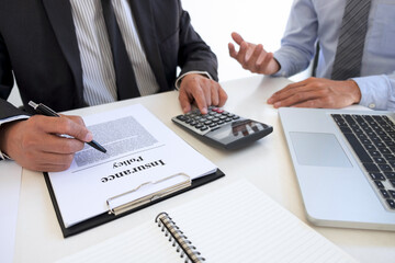 Agent man presentation and consulting life insurance detail to customer