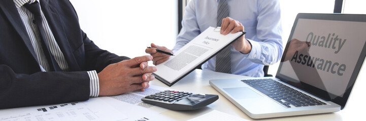 Agent man presentation and consulting life insurance detail to customer