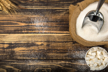 Sugar on wooden table