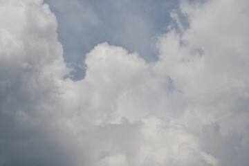 Beautiful white fluffy clouds on a blue sky