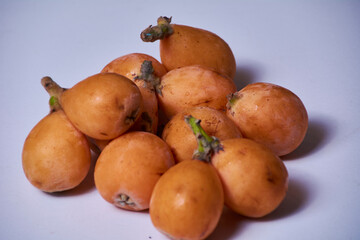 Set of medlars in order on white table