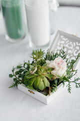 Wedding rings close-up in a beautiful box, during the bride's gathering. Accessories
