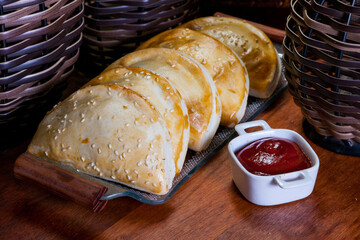 Brazilian snacks, roasted pastel on white background