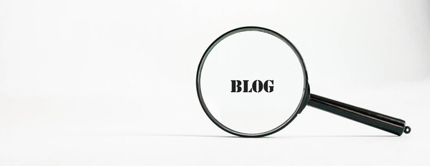 Young creative man writing ideas on paper.