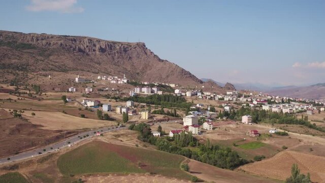 Sebinkarahisar city in north center Turkey in drought mountains landscape.  Aerial drone wide view at summer sunny day