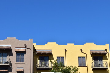 Fototapeta na wymiar Artistic Building Against Bright Blue Sky