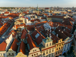 Fototapeta na wymiar Beautiful view of houses with red roofs in Prague, Czech Republic, sunset