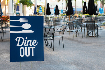 Dine Out Sign Near Outdoor Dining Area