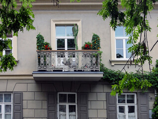 Fototapeta na wymiar A lovely balcony with flowers, Vilnius, Lithuania