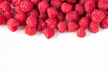 a lot of raspberries on a white background, close-up, red, ripe, juicy berries raspberries layout for design, free space, place for an inscription