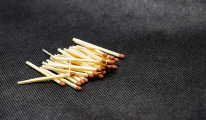 Match, on a black background. Macro shot, perfect for a shelf and for further post-production.