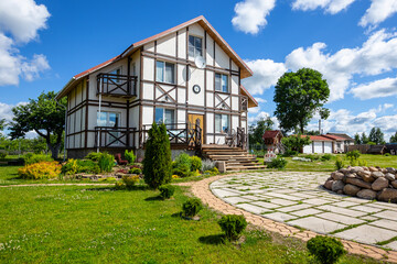 Traditional half timbered german house. Landscape view. Beautiful entrance area.