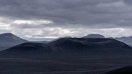 Mountainous landscape in the Landmannalaugar area, deep within the incredible central highlands of Iceland. The mountains are extremely colorful due to volcanic activity of the Torfajökull volcano.