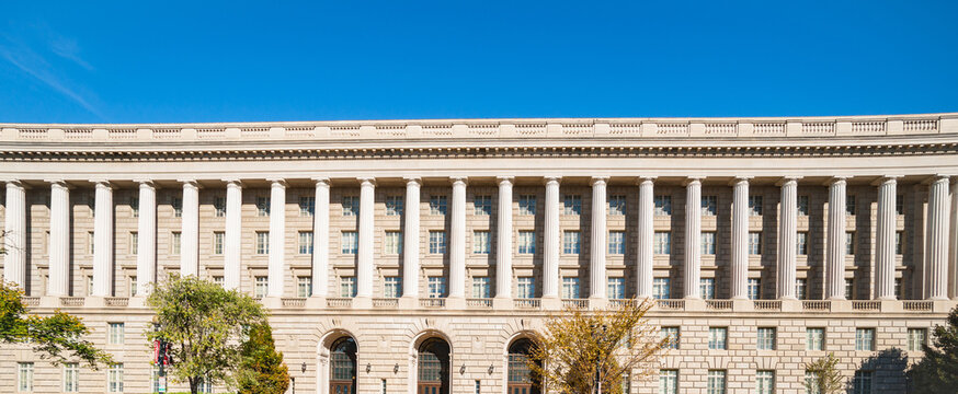 Classical style architecture with repeating design features in banner image.