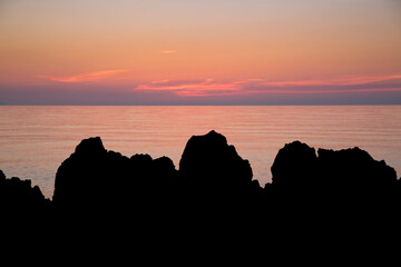 View from Cefalu Harbour wall during sunset, Cefalu, Sicily, Italy - June 2015