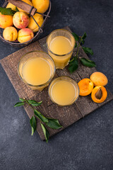 Apricot juice in glass. Healthy drink