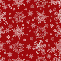Vector red monochrome large snowflakes and scattered small snowflakes seamless background. Suitable for textile, gift wrap and wallpaper.