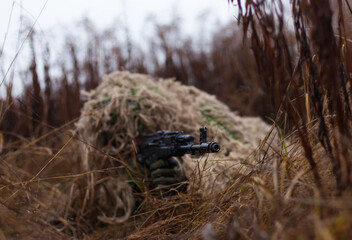 soldier is ready to shoot a disguised kikimora