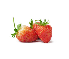 whole ripe red strawberries isolated on a white background