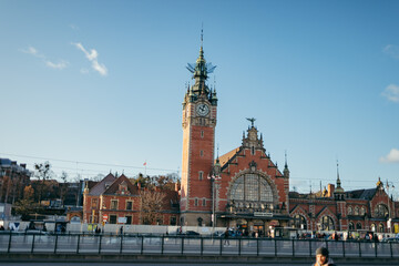A group of people in front of a building
