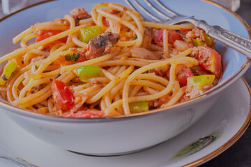 Sardines with vegetables and pasta.