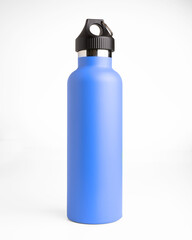 blue  stainless steel thermos bottle on white background for mockup
