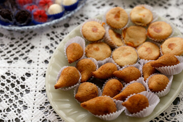several delicious snacks with chicken on white plate