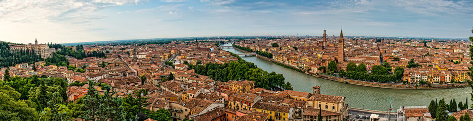 Fototapeta na wymiar A wide panorama of Verona and the Adige river in Tuscany Italy
