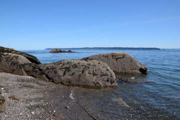 Rocky coastline of Nova Scotia, Canada under the blue sky