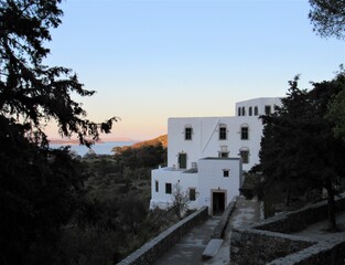 The entrance to the Cave of the Apocalypse, where John of Patmos received his visions that he recorded in the Book of Revelation, with a view of the sea on the island Patmos in Greece