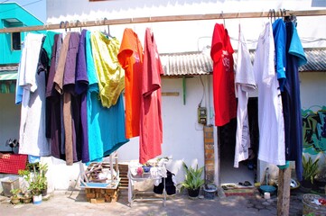 hanging clothes front of house