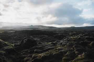 Wonderful icelandic nature. Rocky land, high mountains, dramatic sky. (Iceland)