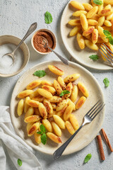 Tasty potato dumplings served with sugar and cinnamon