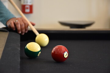 Black billiard table, Playing billiard - Close-up shot of a man playing billiard