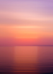 Naklejka na ściany i meble Abstract background motion blur sunset on the sea