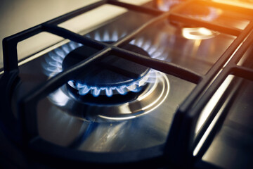 Kitchen gas cooker with burning fire propane gas
