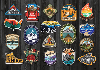 Set of Vintage Outdoor Summer Camp Logo Patches on Wood board. Hand drawn and vector emblem designs. Great for shirts, stamps, stickers logos and labels. - obrazy, fototapety, plakaty