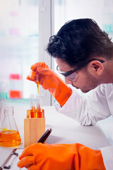 Male scientist doing a research in the laboratory