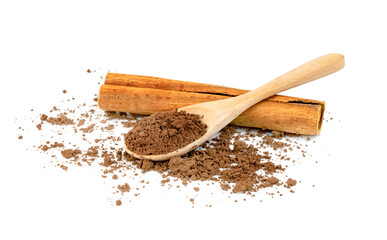cinnamon powder and sticks with wooden spoon on a white background