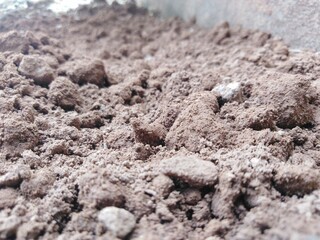 Fresh organic soil texture and soil background. Soil stones and grunge