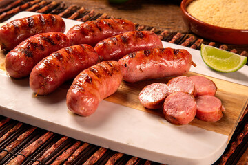 Fresh grilled Pepperoni sausage. Grilled Pepperoni Sausage on wooden board. 