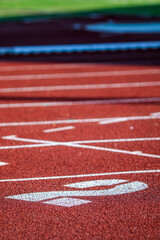 Red running sport track background and texture. Sport running track concept.