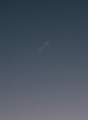 crescent moon with motion blur with blue background