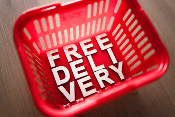 online purchases concept, shopping basket with Free Delivery text in it