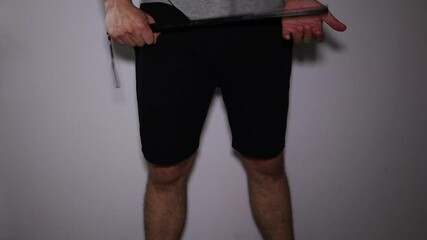 Man takes out the telescopic bat and threaten with it