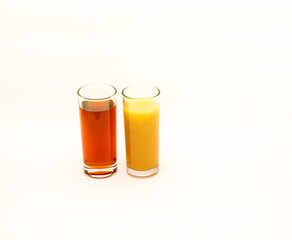 Fototapeta na wymiar Delicious freshly squeezed fruit juice isolated against a white background 