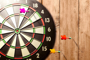 Arrow missing the target in the darts © Leo Lintang